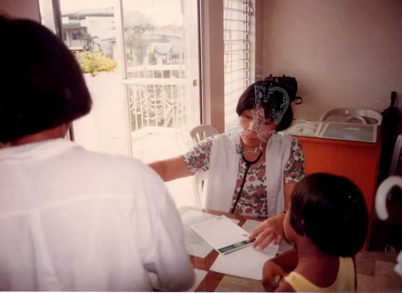 Sacred Heart clinician conducting a community health consultation